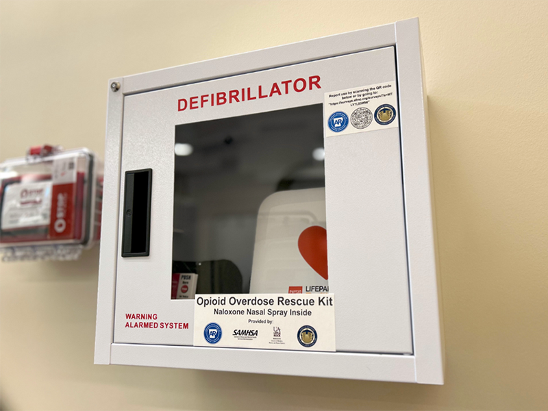 Narcan (naloxone) kit in an AED location at PWHC